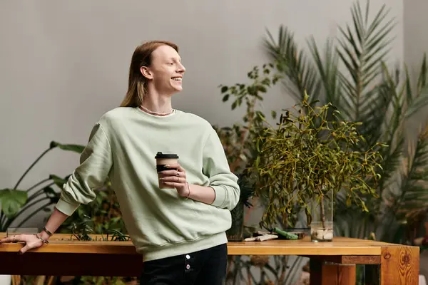 Joyful handsome man in stylish attire in workshop studio. — Stock Photo