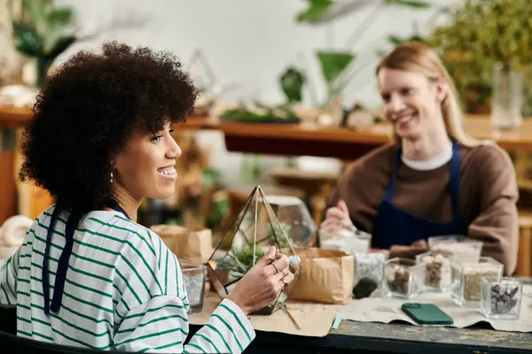 Participants joyfully craft unique succulent arrangements, sharing laughs and creativity together. — Stock Photo