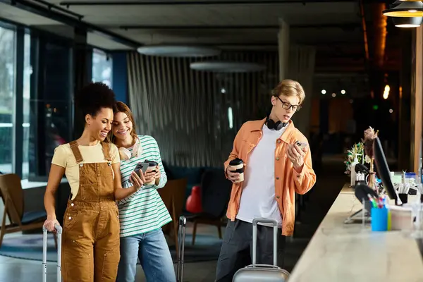 Three colleagues enjoy a cheerful moment together in a hotel lobby during their travels. — Stock Photo