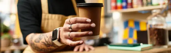 A young woman sitting at a cafe, savoring her coffee and engaging in delightful conversation. — Stock Photo