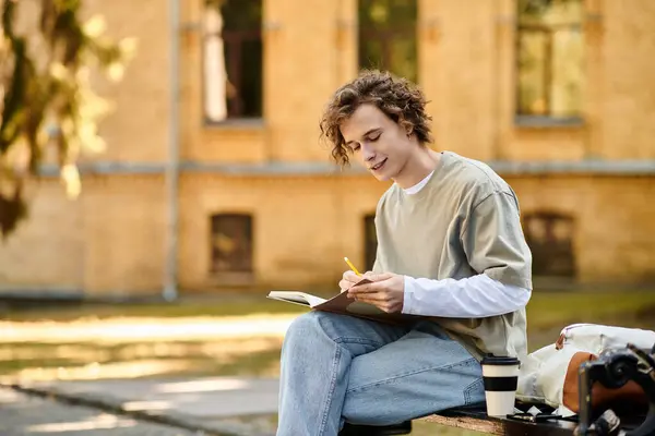 Stylish student enjoys a warm day outdoors, drawing in a notebook while seated on a bench — Stock Photo