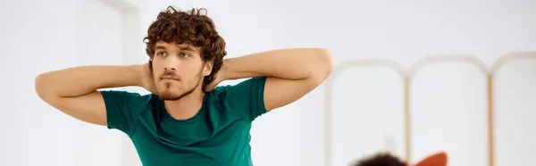 Person focuses intently during Pilates in a calm, modern studio. — Stock Photo