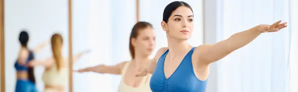 Participants engage in a guided session, focusing on core stability and posture improvement. — Stock Photo