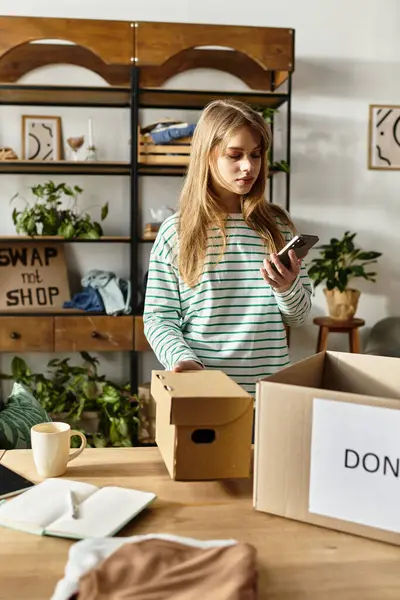 Young woman sorts through her clothes, preparing to donate and embrace sustainability. — Stock Photo