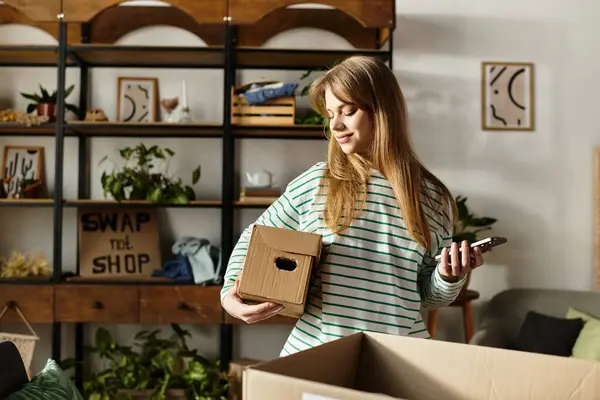 Pretty young woman organizes her clothes, contributing to a more sustainable lifestyle. — Stock Photo