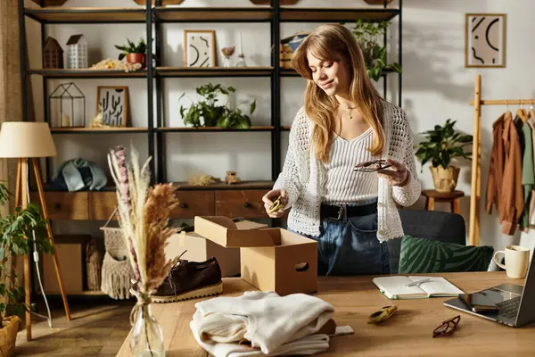 Young woman organizes her clothes for recycling while embracing a sustainable lifestyle. — Stock Photo