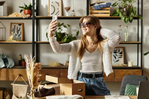Engaging in recycling and donating clothes, a young woman promotes sustainability with a smile. — Stock Photo