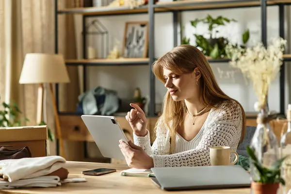 Pretty young woman engages in planning of clothing donations in her cozy space. — Stock Photo