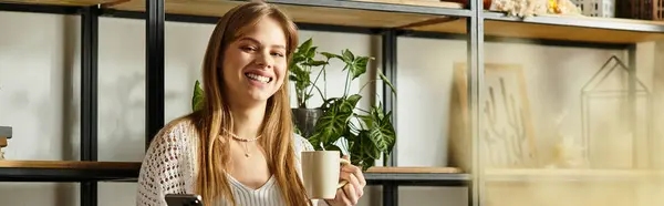 Woman enjoying a warm drink, promoting sustainable living, banner — Stock Photo