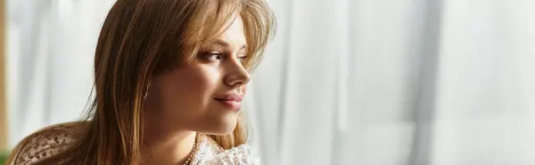 A pretty young woman enjoys a peaceful moment at home, reflecting on her thoughts and feelings, banner — Stock Photo