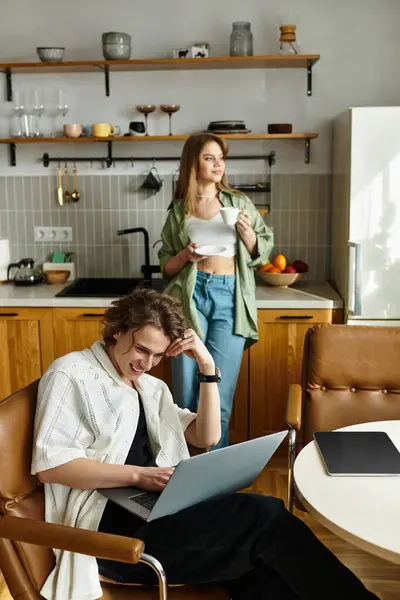 Loving couple shares a warm and comfortable atmosphere at home, balancing work and leisure well — Stock Photo