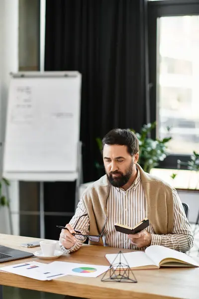 Elderly gentleman thoughtfully reviews notes at a wooden desk in a sunny room. — Stock Photo