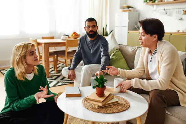 Young men bond over literature in a stylish, modern living space while sharing ideas and stories. — Stock Photo