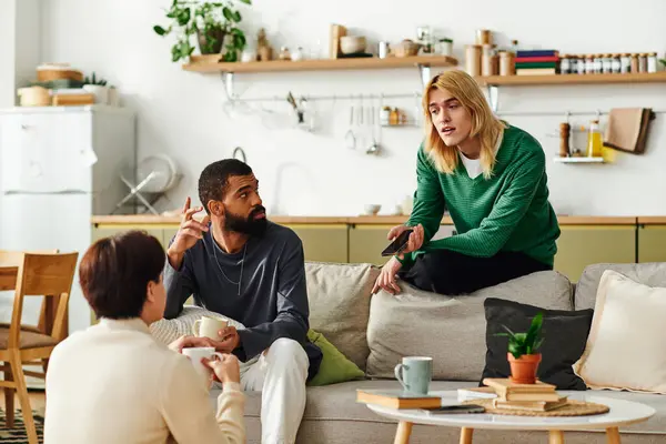 Young men share insights and ideas during an animated conversation in a relaxed setting at home. — Stock Photo