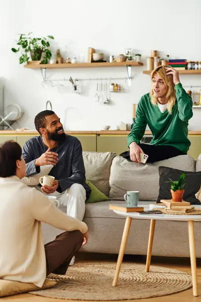 Dynamic group of diverse young men enjoy thoughtful discussions in a cozy home setting. — Stock Photo