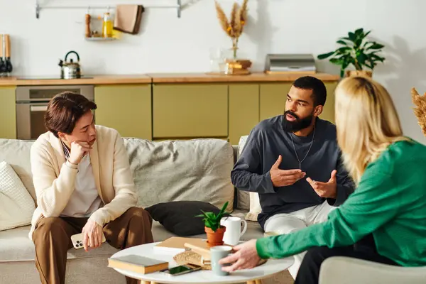 Young men share insights and foster connections in a stylish, inviting book club setting. — Stock Photo