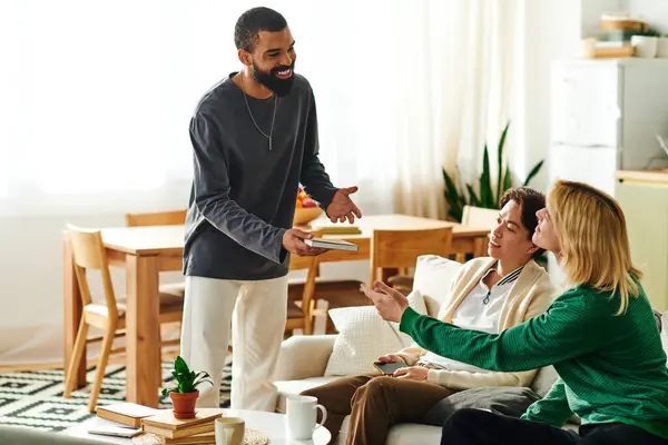A group of young men share thoughts and insights during a lively meeting in a modern home. — Stock Photo