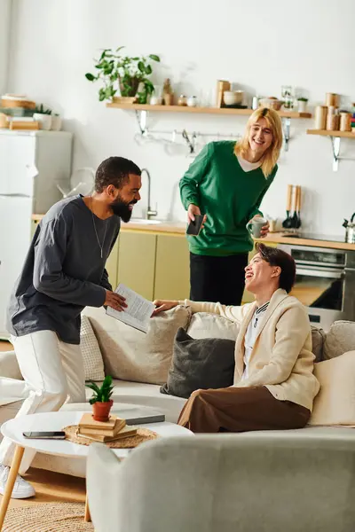 A lively book club meets with young men sharing ideas in a stylish living room. — Stock Photo