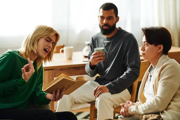 Three handsome young men share their thoughts passionately in a warm, inviting atmosphere. — Stock Photo