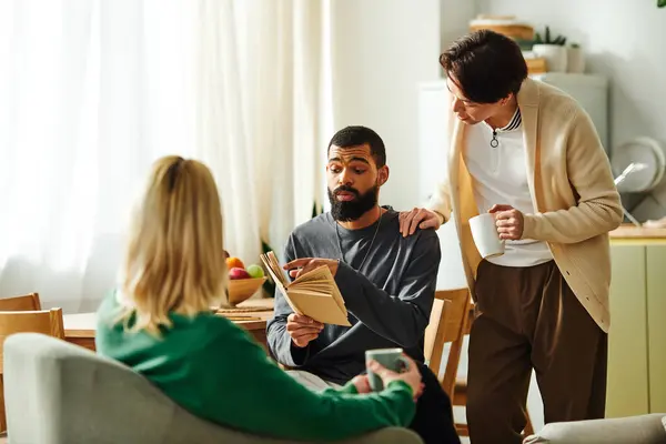 Young men share insights and thoughts in a relaxed home during a book club meeting. — Stock Photo