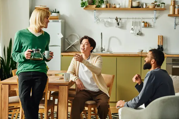 Diverse young men enjoy stimulating discussions while relaxing in a modern home environment. — Stock Photo
