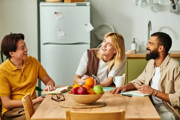 Three stylish young men share lively conversations while enjoying a book club meeting at home. — Stock Photo