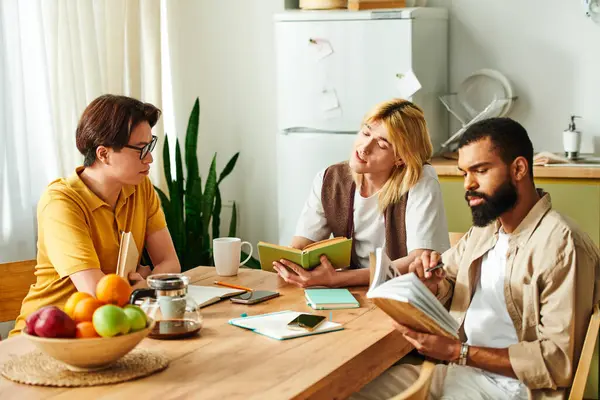 Three young men share book insights at a cozy table in a warm, inviting space. — Stock Photo