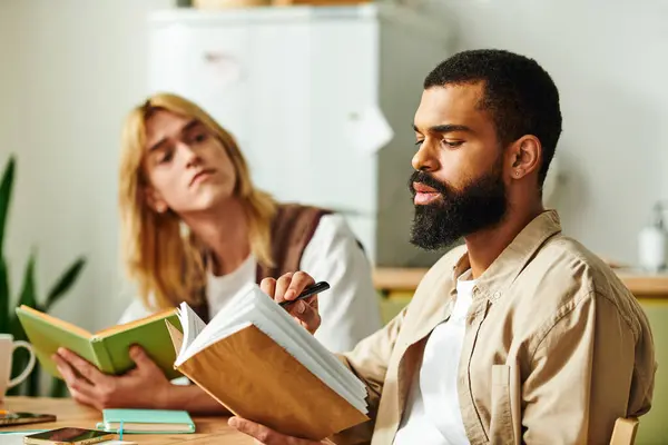 Handsome young men enjoy deep discussions during a casual book club meeting at home. — Stock Photo