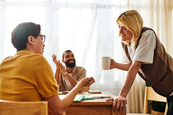 Young men share ideas and enjoy each others company during a casual book club meeting. — Stock Photo