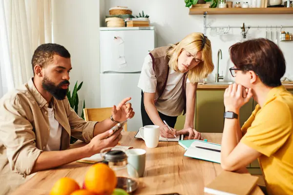 Three handsome young men share lively conversations and ideas in a stylish home book club setting. — Stock Photo