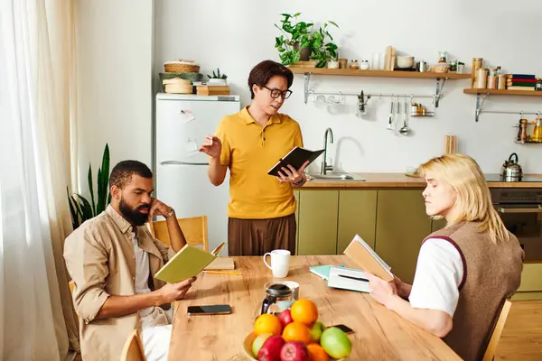 Three stylish young men discuss books over coffee in an engaging club session. — Stock Photo