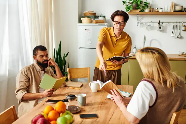 Three young men gather in a cozy home setting, passionately discussing books while reading notes. — Stock Photo