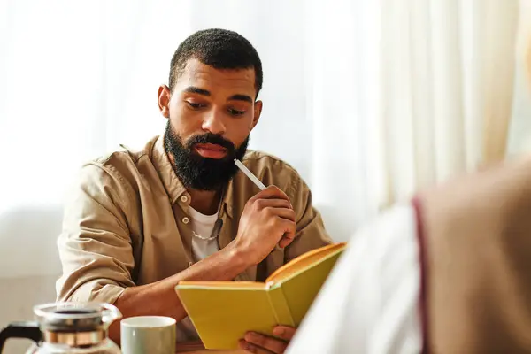 Handsome young men share ideas and insights during an engaging book club meeting at home. — Stock Photo