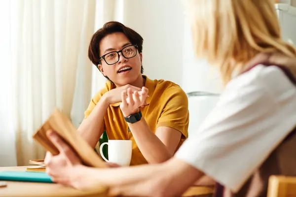 Young men exchange ideas in a welcoming setting at their speaking club in a modern home. — Stock Photo