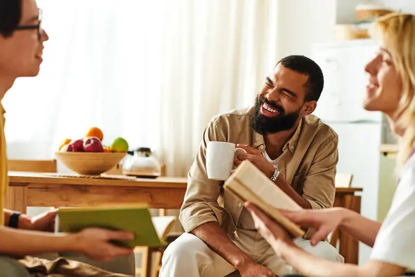 Young men share ideas and laughter in a relaxed book club gathering filled with joy. — Stock Photo