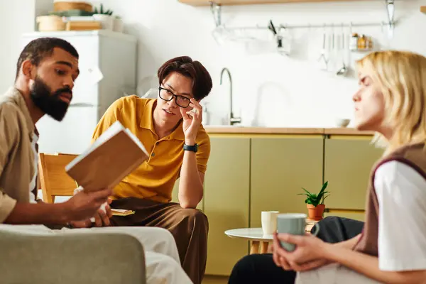 A group of diverse young men engages in thoughtful conversations during a book club meetup at home. — Stock Photo