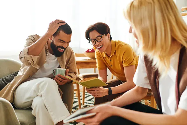 Diverse group of handsome young men enjoying lively conversations while reading together at home. — Stock Photo