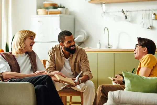 Friends enjoy lively conversations and share insights during a book club meeting at home. — Stock Photo