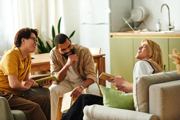Three diverse young men enjoy a lively discussion in a stylish, inviting book club atmosphere. — Stock Photo
