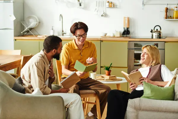 Three young men share laughs and insights at a cozy book club in a stylish home. — Stock Photo
