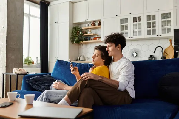 Gay couple enjoys a quiet afternoon together, sharing smiles and laughter in their modern living space. — Stock Photo
