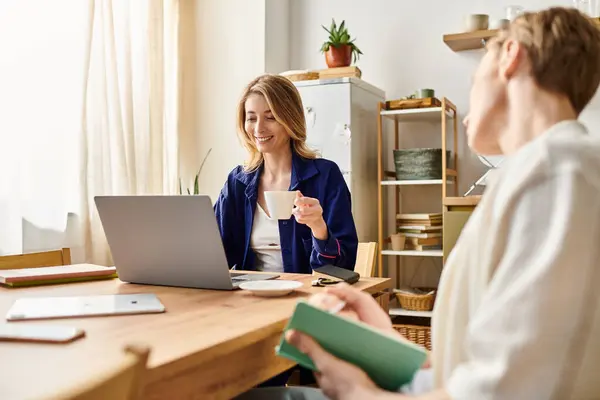 A young couple shares a warm, loving moment in their stylish home. — Stock Photo