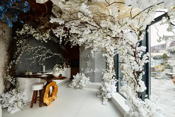 Elegant accessories and white flowers create a magical vibe in a stylish space. — Stock Photo