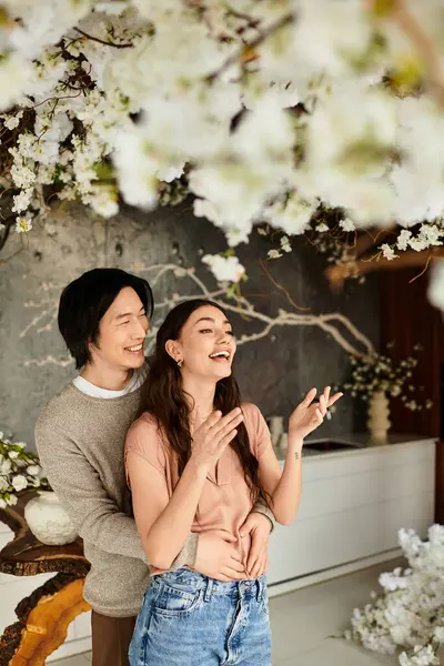 Man and woman share laughter and excitement while getting ready for their wedding celebration. — Stock Photo