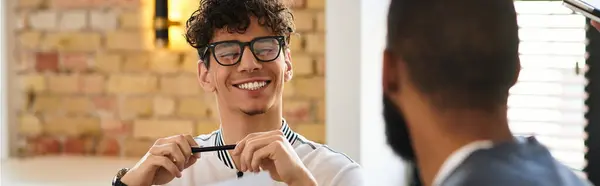 Two professionals enjoy a light moment in a chic office, boosting teamwork and creativity. — Stock Photo