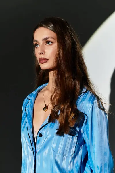 A confident young woman displays her unique style in a creative, modern environment. — Stock Photo