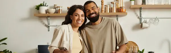 A loving African American couple shares a cozy, happy moment together at home. — Stock Photo