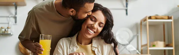 A happy couple cherishes their time in a cozy home filled with love and laughter. — Stock Photo