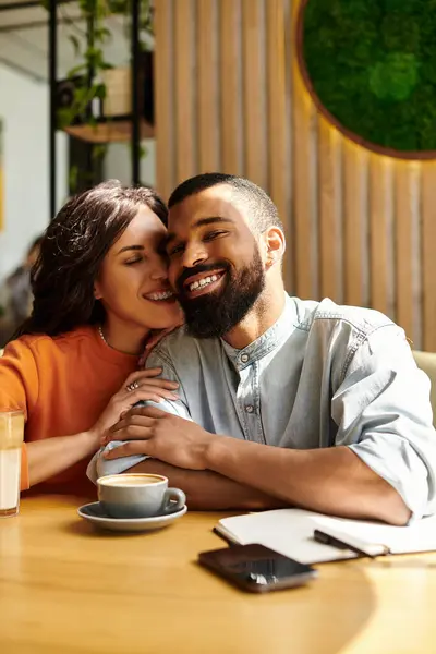 An African American couple shares smiles and warmth in a cafe, enjoying each other's company. — Stock Photo