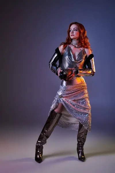 A young woman radiates elegance in a shimmering outfit inspired by castle core aesthetics. — Stock Photo